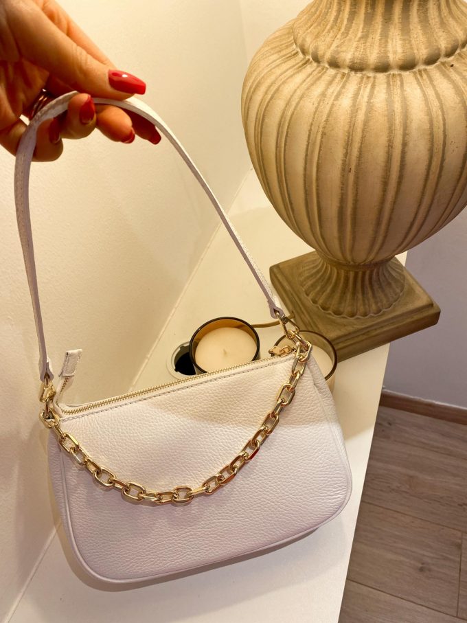 Leather bag with gold.