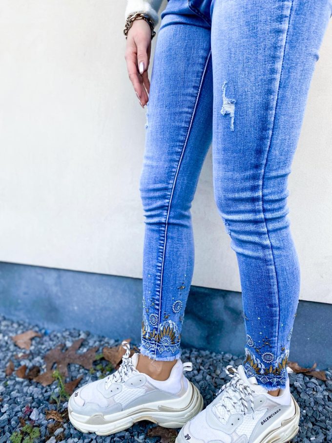 Skinny jeans diamanten/bloem.