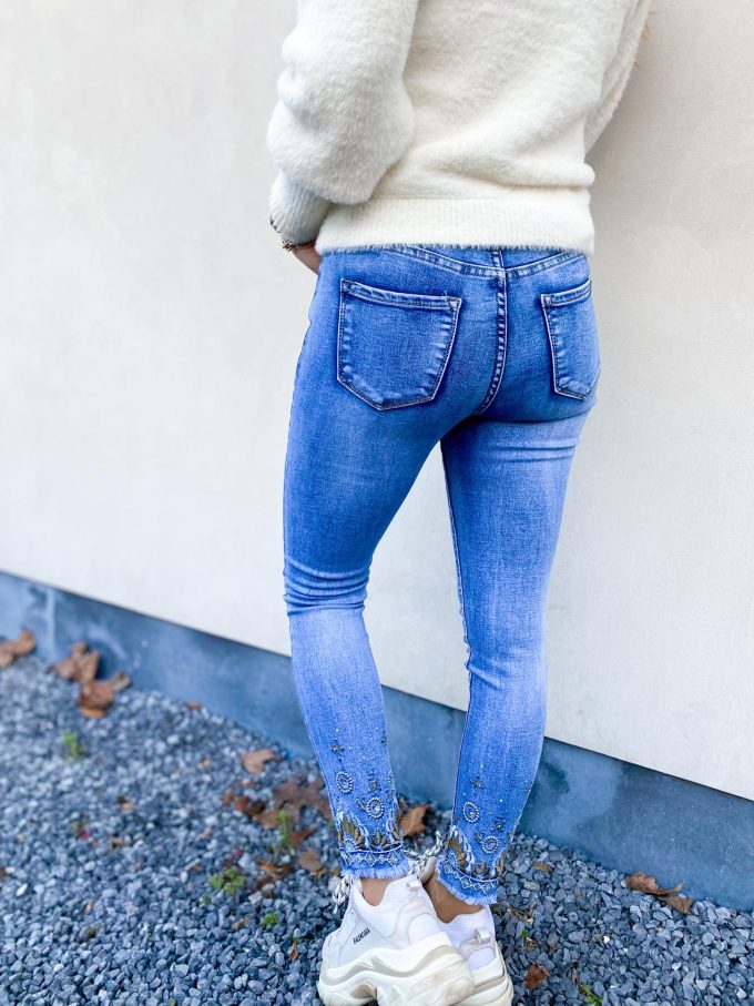 Skinny jeans diamanten/bloem.