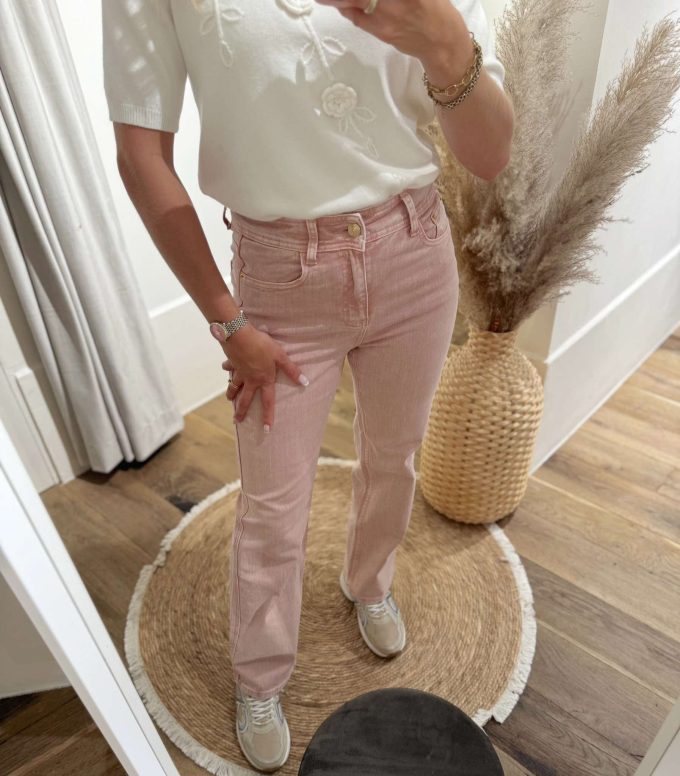 Jeansbroek pink gouden knoop.