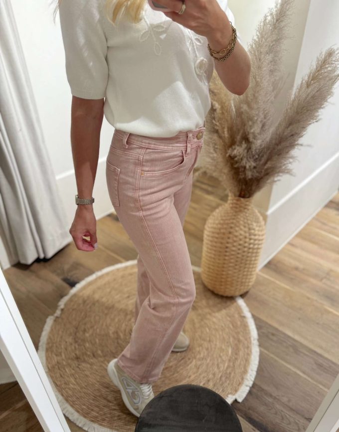 Jeansbroek pink gouden knoop.