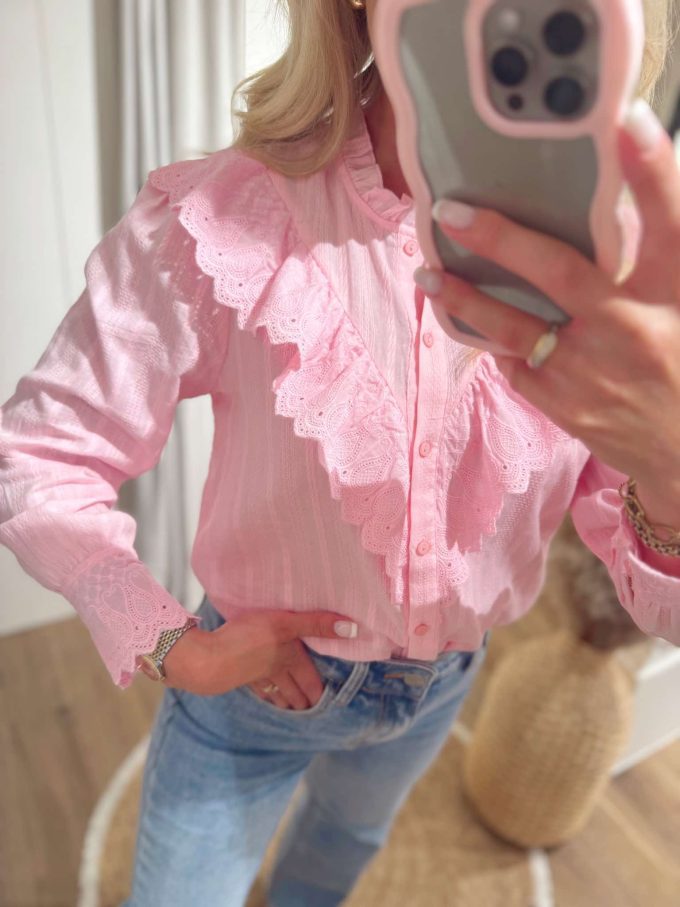 Pink blouse.