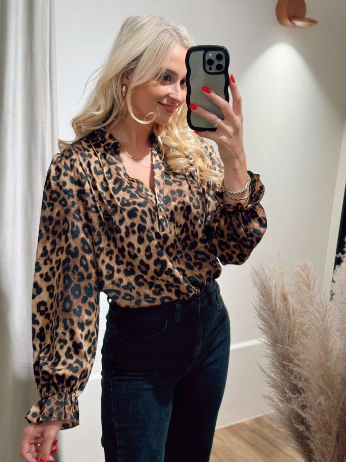 Leopard blouse.