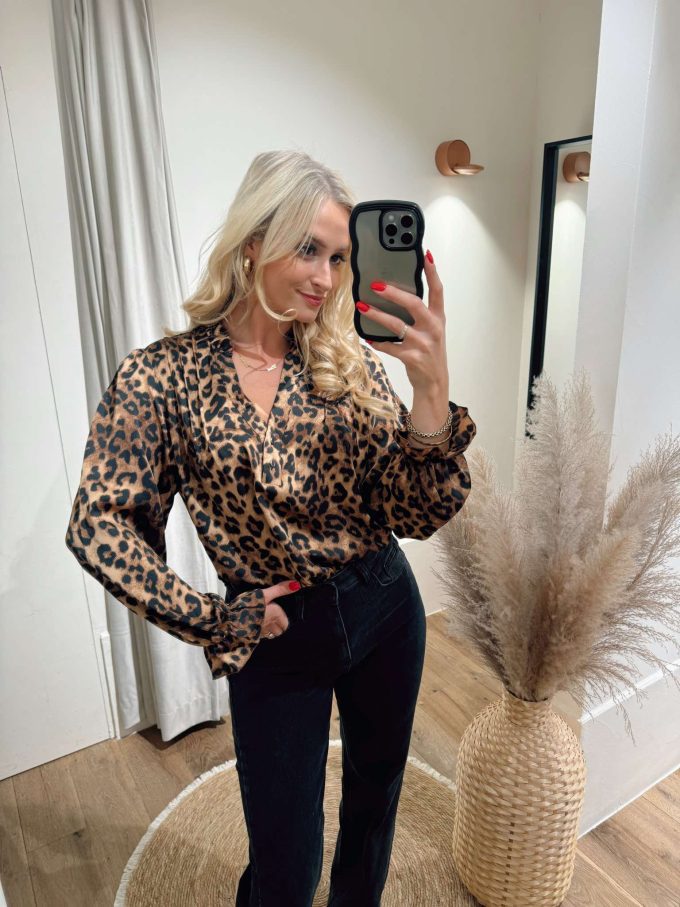 Leopard blouse.