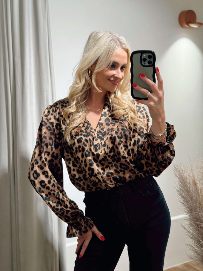 Leopard blouse.