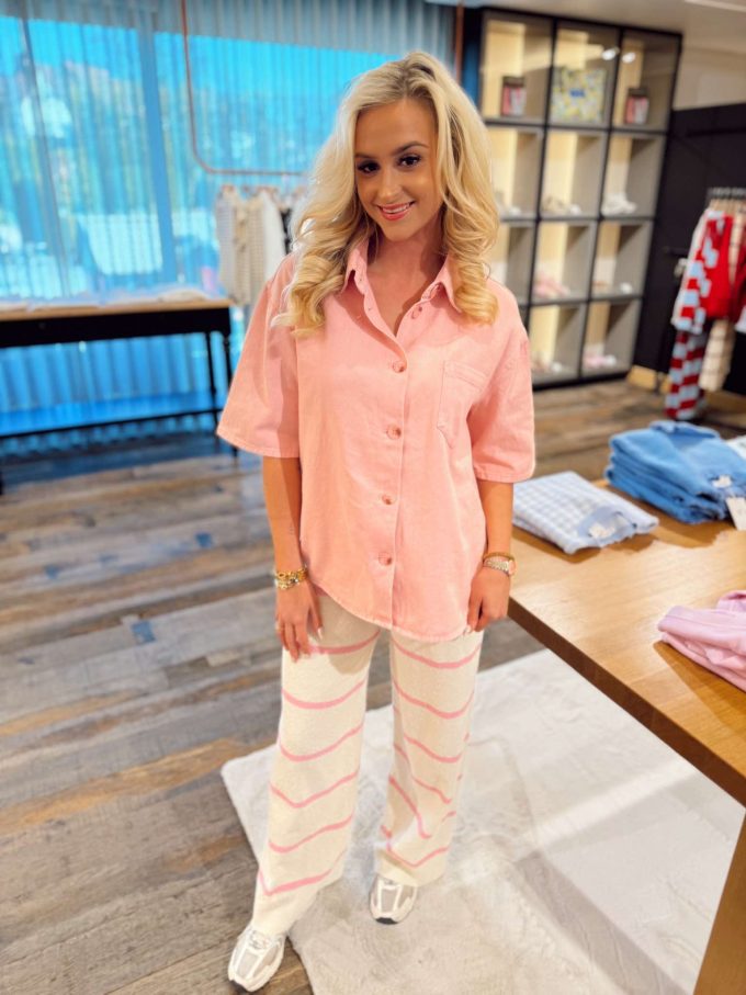 Pink jeans top.