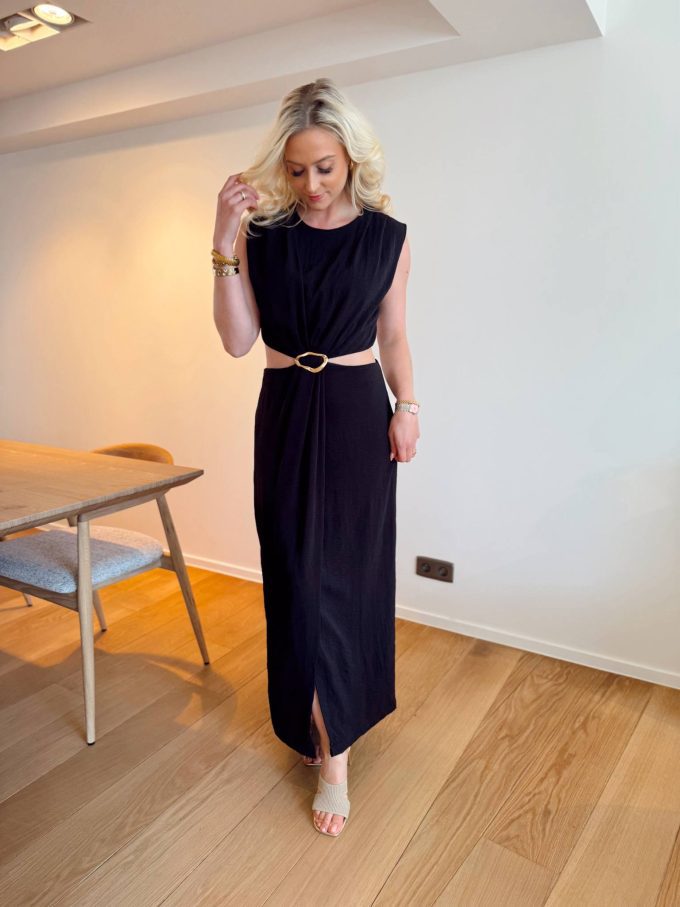 Black dress golden detail.