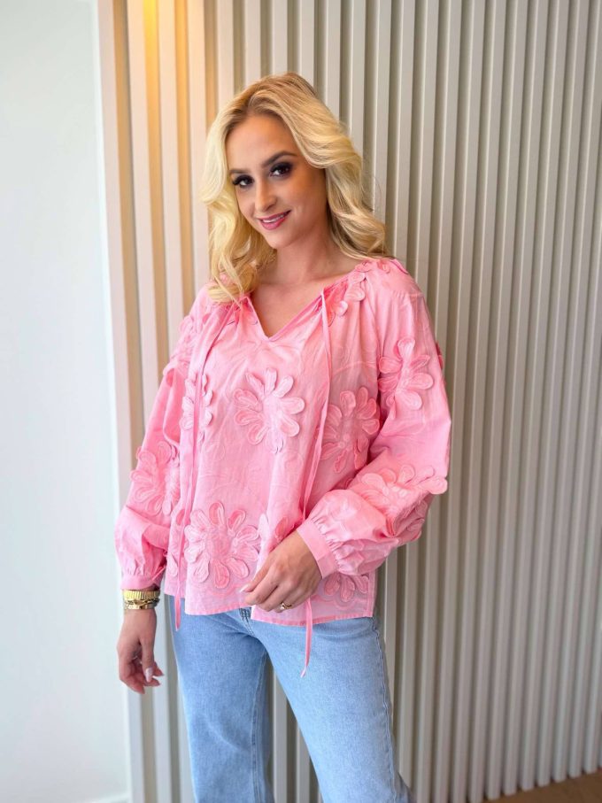 Blouse en coton fleur texturé.