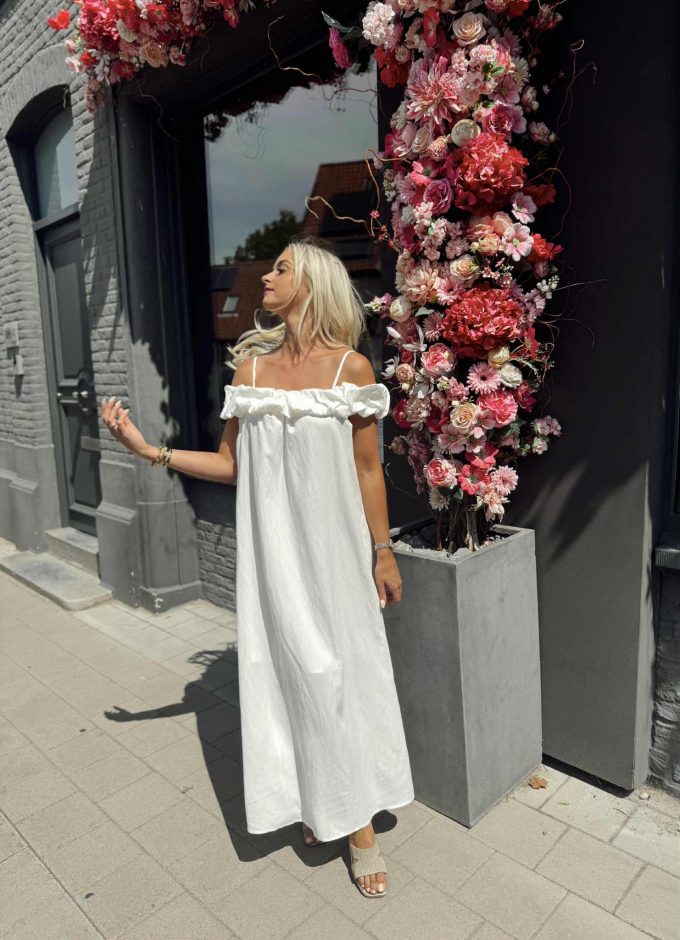 Ecru busté dress.