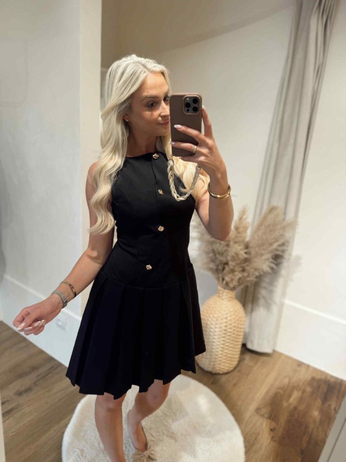 Pleated button dress.