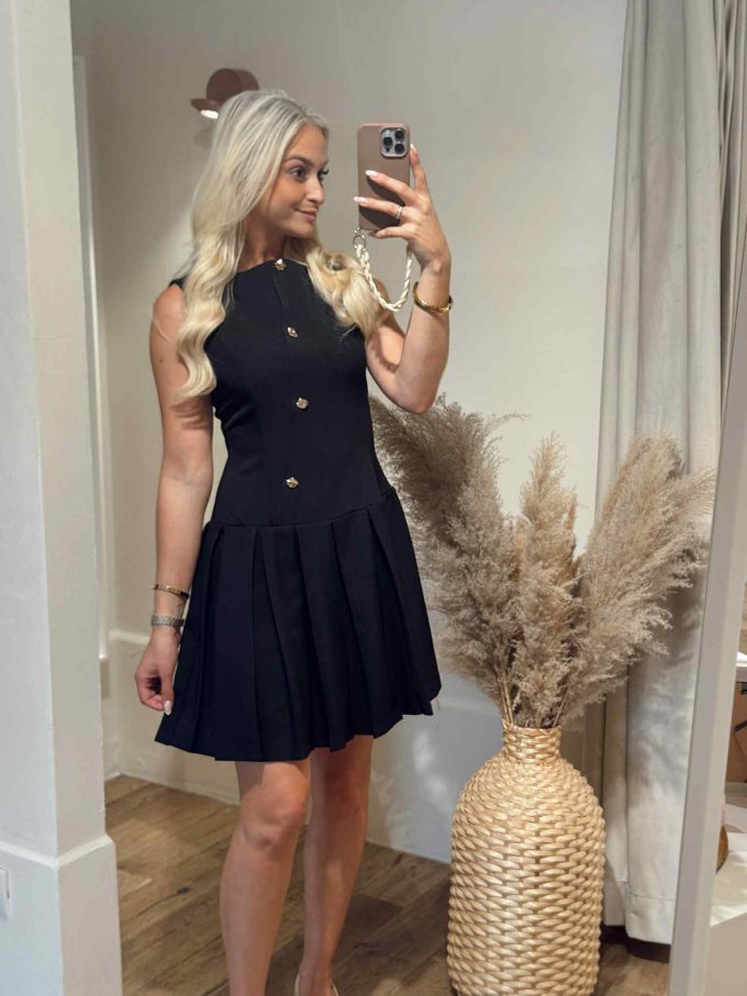 Pleated button dress.
