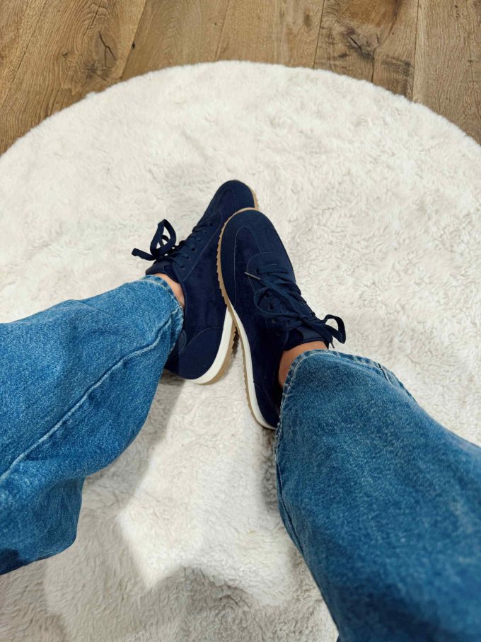 Navy sneakers.