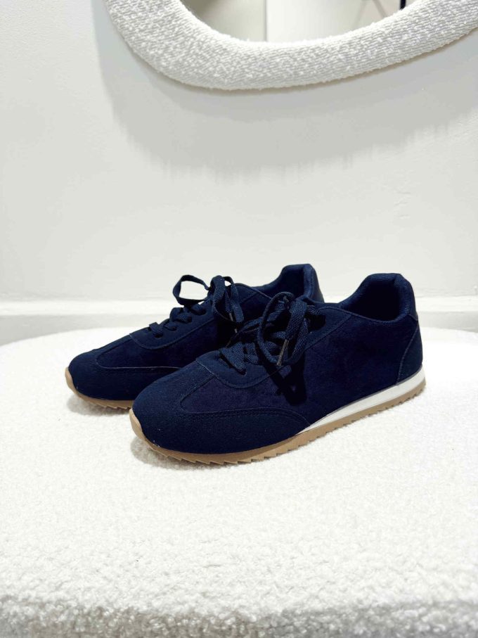 Navy sneakers.