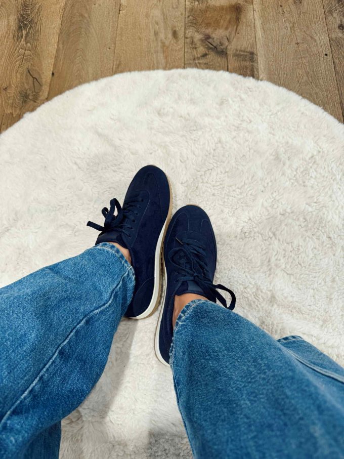 Navy sneakers.